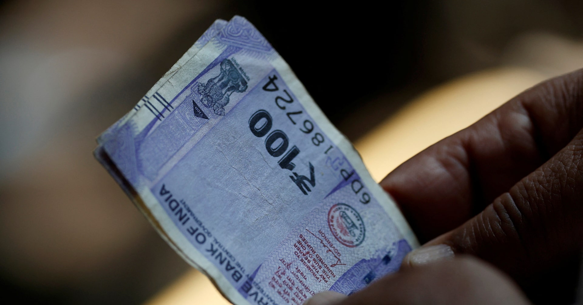 India rupee ends just shy of record low on companies' dollar bids